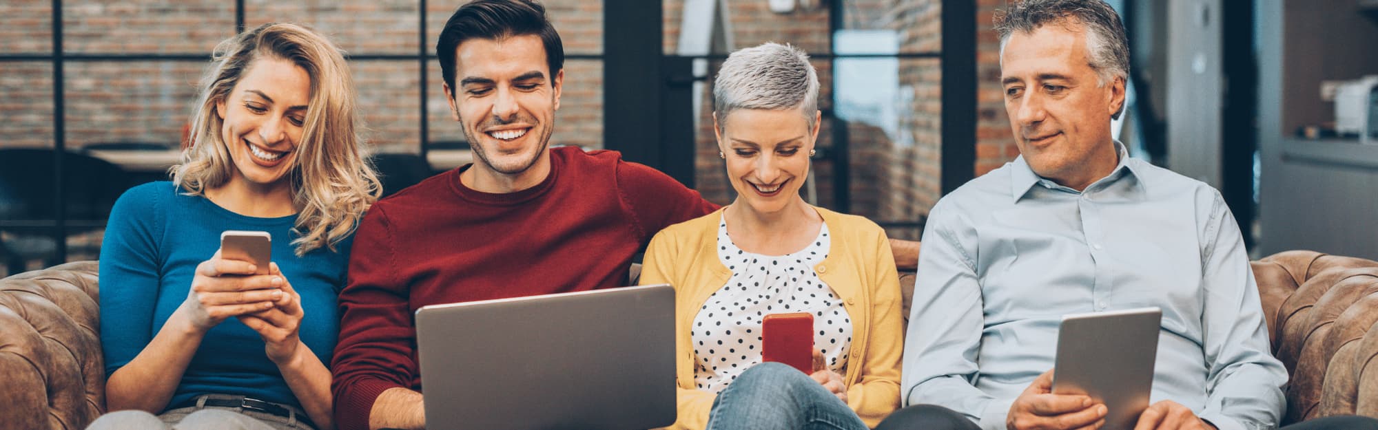 people looking at mobile devices